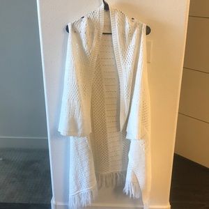 Fringe Shaw. Never worn size L